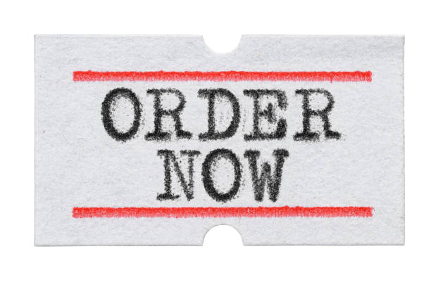 istock Order Now printed on price tag sticker isolated on white 1427205098