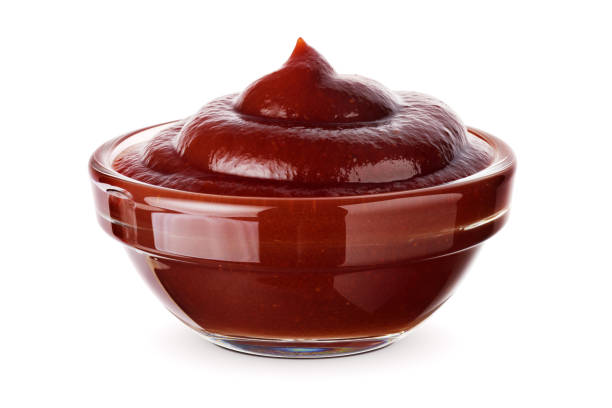 istock Bowl of barbecue sauce isolated on white. 1427205112