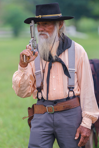 portrait of cowboy with a gun