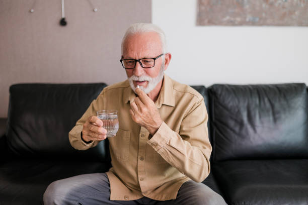 istock Senior man taking daily dosage of medicines 1427211907