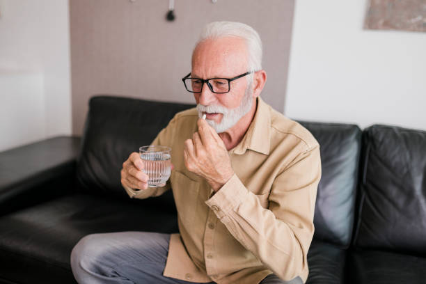 istock Senior man taking daily dosage of medicines 1427212877