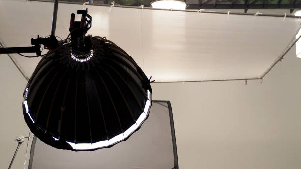 istock Camera spotlight tool equipment for photo and video works in big studio. 1427214929