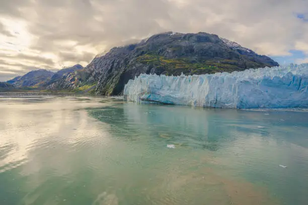 Tide water glacier near headland at Glacier Bay, Glacier Bay National Park Alaska