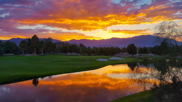 Spectacular Sunset at Palm Desert Spectacular colorful sunset and lake reflection at Shadow Ridge in Palm Desert, California wilderness photos stock pictures, royalty-free photos & images