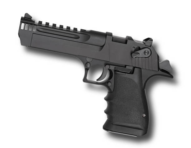 istock Profile of a large semi-automatic pistol with a shadow behing 1427223257