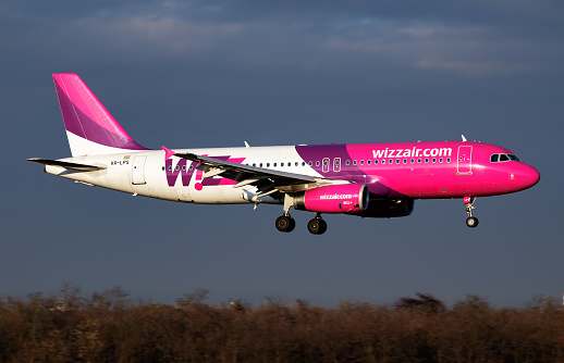 Budapest, Hungary - November 18, 2016: Wizz Air passenger plane at airport. Schedule flight travel. Aviation and aircraft. Air transport. Global international transportation. Fly and flying.