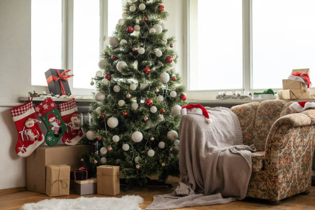 istock interior christmas. magic glowing tree, gifts 1427235081
