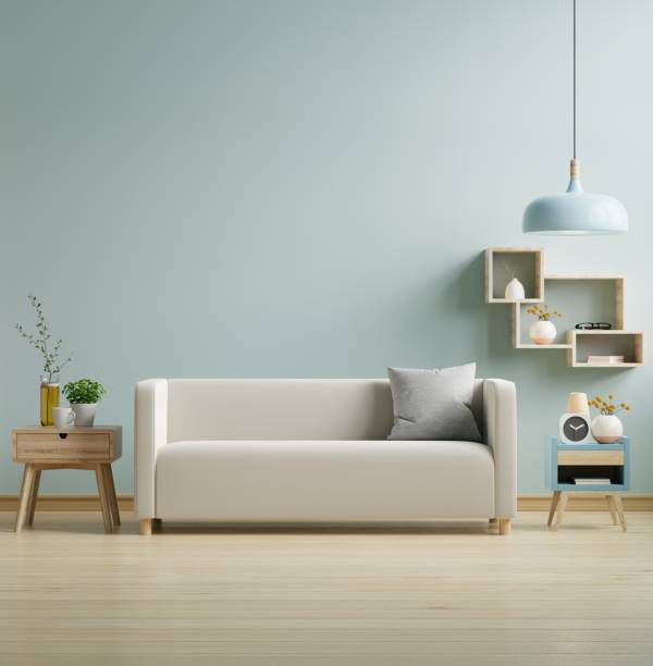 istock Modern living room interior with sofa and room decoration on light blue wall background. 1427241019