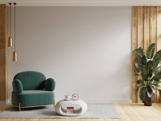 istock Modern interior of wall space with green armchair on empty white room. 1427241116