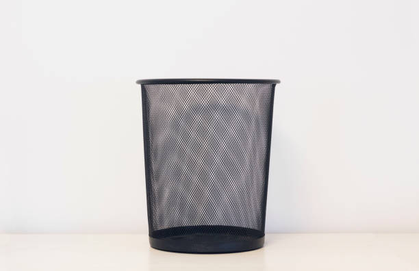 istock Office trash can on wooden floor 1427245943
