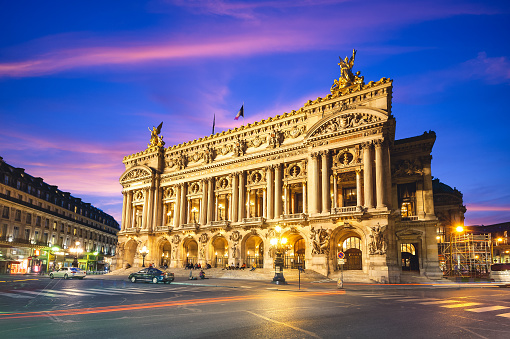 Paris, France - June 15, 2015: Night view of the Palais Garnier, Opera in Paris, France. It is a 1,979-seat opera house, which was built from 1861 to 1875 for the Paris Opera.