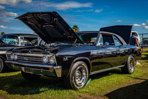 1967 Chevrolet Chevelle SS 396 Hardtop Coupe Daytona Beach, FL - November 28, 2020: Low perspective front corner view of a 1967 Chevrolet Chevelle SS 396 Hardtop Coupe at a local car show. Chevrolet stock pictures, royalty-free photos & images