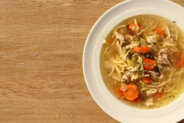 istock a delicious chicken soup with carrots 1427261908