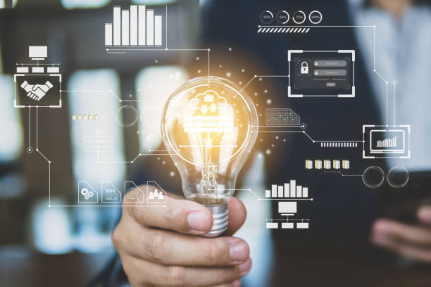 istock Business idea and innovation, Businessman holding light blub with data business plan chart. 1427265056