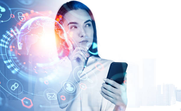 istock Businesswoman thinking and using smartphone, earth sphere hud icons. Copy space 1427266690