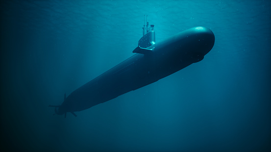 3D rendering of a nuclear submarine moving underwater.