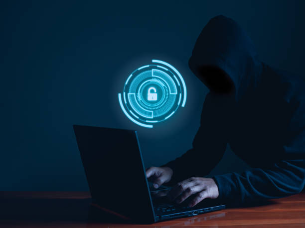 istock Hackers work on laptops in the dark. The concept of information security in the Internet network and information espionage. 1427269427