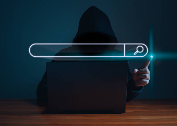 istock Hackers work on laptops in the dark. The concept of information security in the Internet network and information espionage. 1427269443