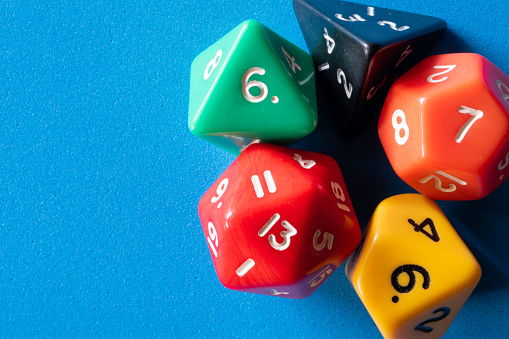 role dice with blue background