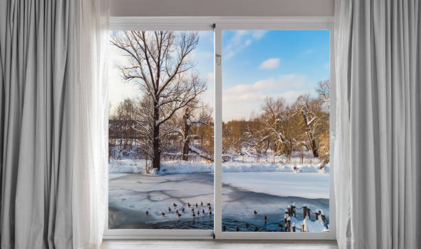 istock view from the window to the snow-covered trees 1427275893