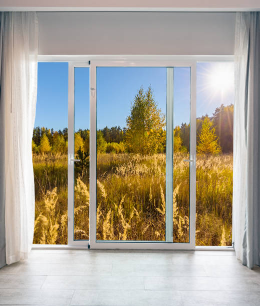 istock glass door autumn landscape 1427275899