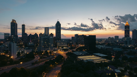 busy highways intersect in downtown Atlanta at sunset