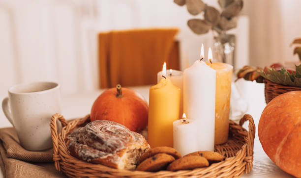 Beautiful interior with autumn mood with pumpkins and homemade cakes stock photo
