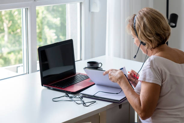istock Senior woman online learning 1427285151