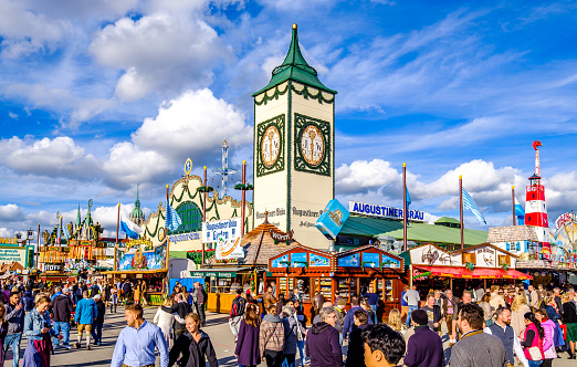 Munich, Germany - September 19: People, sales booths and typical decoration on the Oktoberfest (the world's largest folk festival) in Munich on September 19, 2022