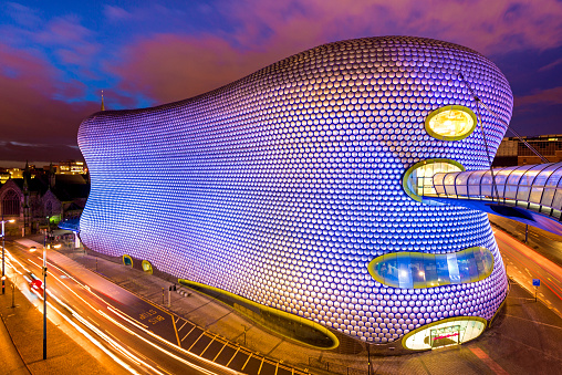 Birmingham, England, UK - A wide angle view of the Bullring Shopping Centre at dusk. This building was opened in 2003.