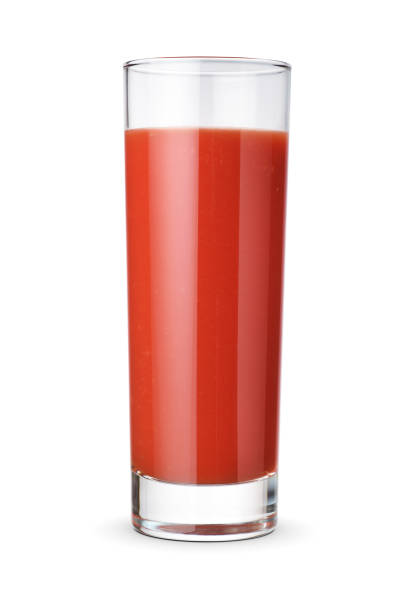 istock Tomato juice glass isolated on white. 1427288779