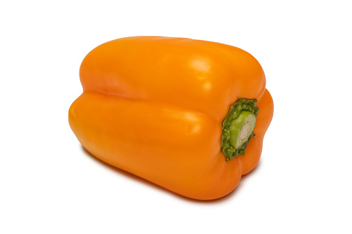 Orange bell pepper isolated on a white background. Top view.  Copy space.