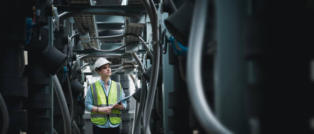 istock Engineers are inspecting a large building or industrial facility's cooling system for the air conditioning. 1427290791