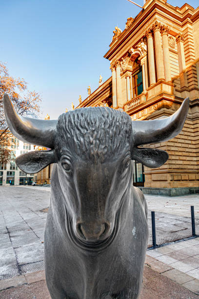 The struggle between bulls and bears symbolizing rising or falling financial markets.