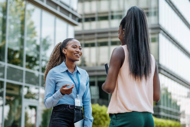 istock African real estate agent talking to client while renting office space for new business 1427298084