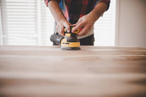 istock Sanding a wood table to give it a new look 1427315954
