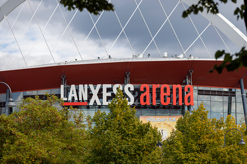 Cologne, Germany: Sep 25th 2022: LanXess Arena arch is an iconic landmark in German city of Cologne.