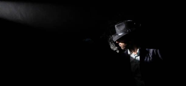 istock portrait of man with smoking hat 1427317300