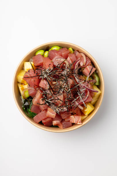 istock Poke with fresh tuna, pineapple, beans on white background 1427317520