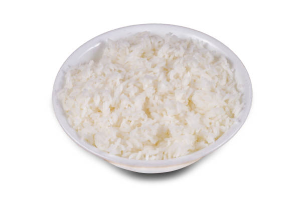 istock boiled rice Served in a bowl over white background. Selective focus. 1427322609