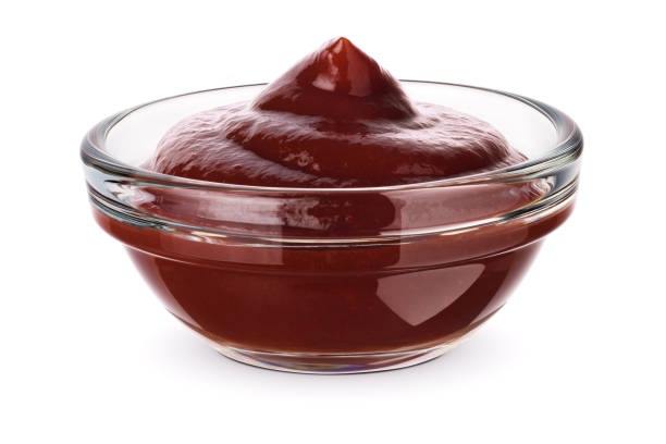 istock Bowl of barbecue sauce isolated on white. 1427344991