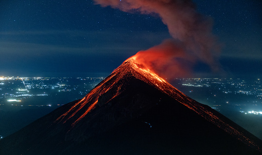 Erupting volcano Fuego, close to Antigua, Guatemala, captured from Acatenango at night