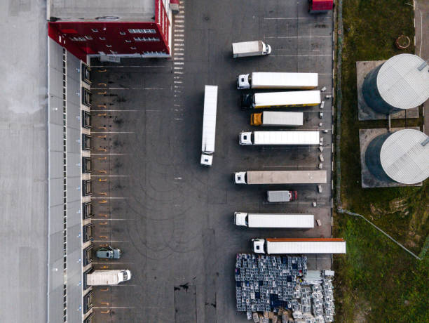 istock Truck parking lot and unloading area in distribution warehouse. Directly above 1427356724