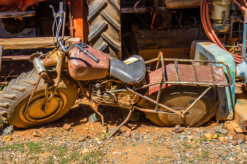 Old Chain Driven Motor Cycle In Junkyard