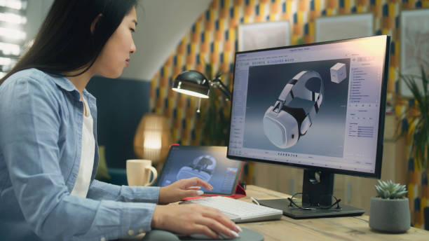 istock Asian woman making 3D model of VR headset 1427366506