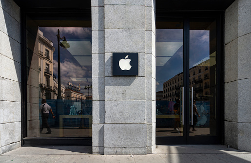 Madrid, Spain, September 2022.  The logo on the wall out of the Apple brand shop in the city center