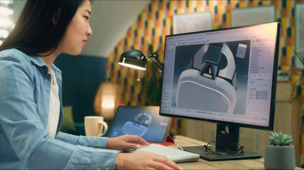 istock Asian woman making 3D model of VR headset 1427369339