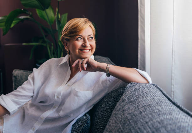 istock A Happy Beautiful Senior Woman Looking Away While Contemplating 1427370020