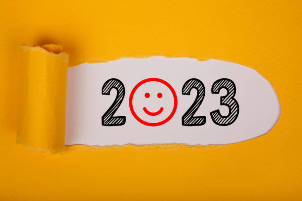 istock Torn Paper With Happy New Year 2023 On White Background 1427371501