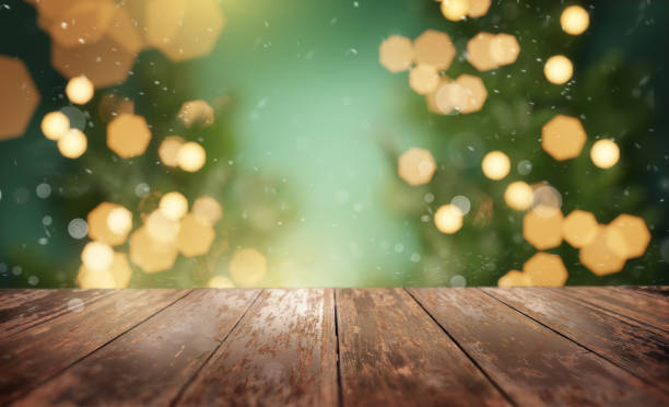 festive wooden table with christmas tree lights - window snow christmas decoration imagens e fotografias de stock